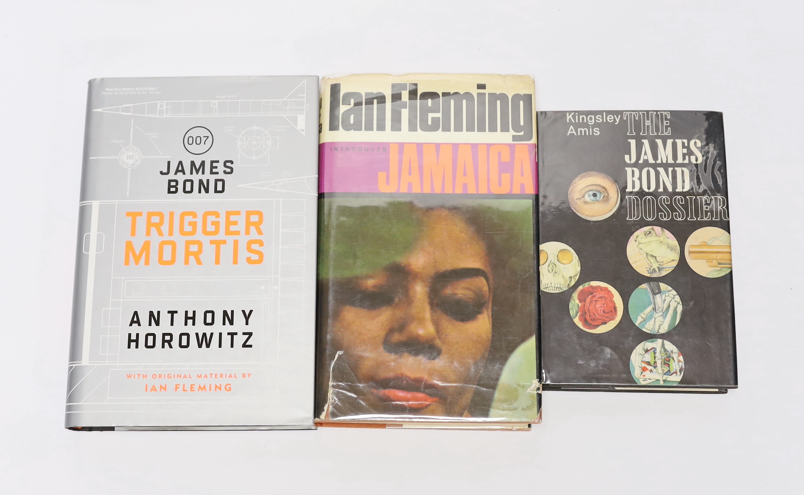 Amis, Kingsley - The James Bond Dossier, with a tipped-in presentation slip, signed by the author, 8vo, black cloth with gilt lettering, with unclipped d/j, Jonathan Cape, London, 1965; Fleming, Ian - Introduces Jamaica,